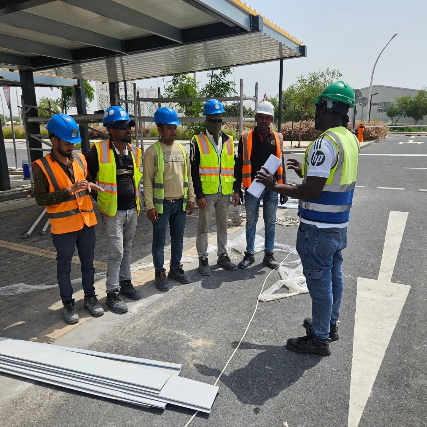 A full construction crew gathered for a HSE briefing on site in Qatar