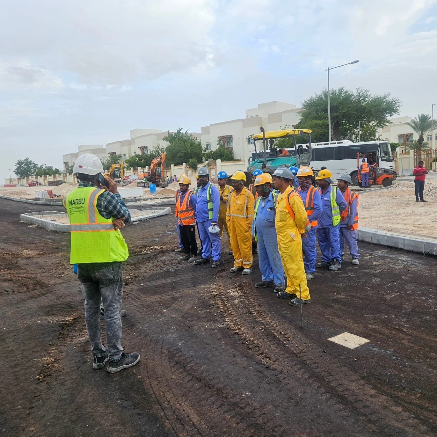 Construction crew during site preparation works on a roundabout project in Qatar